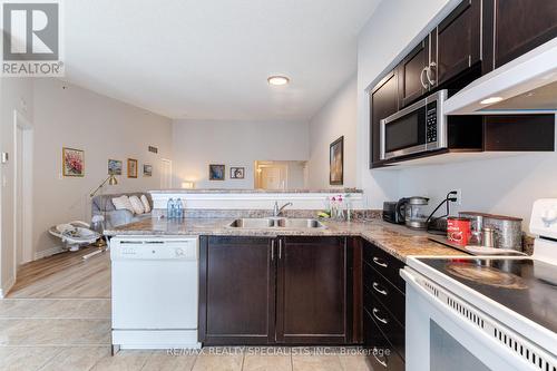 412 - 1350 Main Street E, Milton (Dempsey), ON - Indoor Photo Showing Kitchen With Double Sink