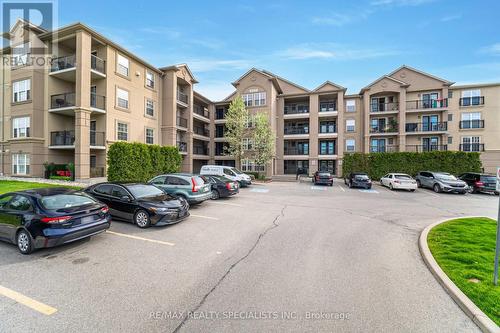 412 - 1350 Main Street E, Milton (Dempsey), ON - Outdoor With Balcony With Facade