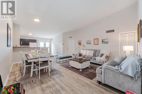 412 - 1350 Main Street E, Milton (Dempsey), ON - Indoor Photo Showing Living Room