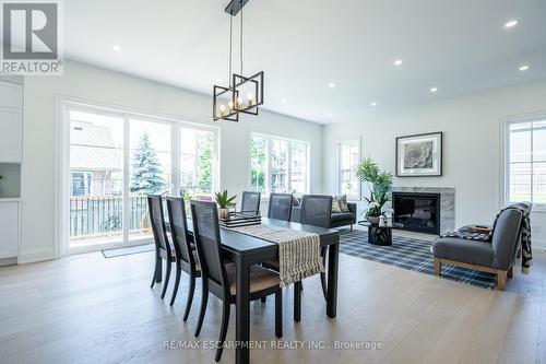 59 Brian Boulevard, Hamilton (Waterdown), ON - Indoor Photo Showing Dining Room With Fireplace