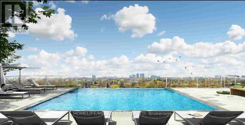 N337 - 7 Golden Lion Heights, Toronto, ON - Outdoor With In Ground Pool With View