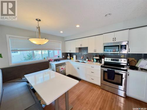 5 4545 Delhaye Way, Regina, SK - Indoor Photo Showing Kitchen With Stainless Steel Kitchen With Double Sink