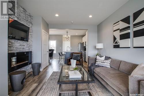 5512 Nicholson Avenue, Regina, SK - Indoor Photo Showing Living Room With Fireplace