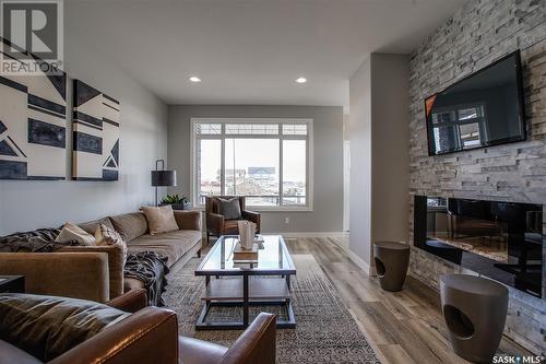 5512 Nicholson Avenue, Regina, SK - Indoor Photo Showing Living Room With Fireplace