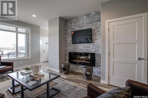 5512 Nicholson Avenue, Regina, SK - Indoor Photo Showing Living Room With Fireplace