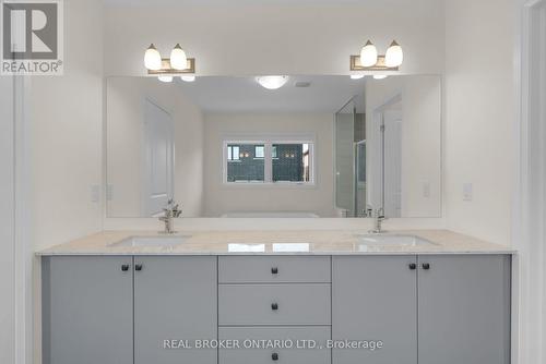 23 Calypso Avenue, Springwater, ON - Indoor Photo Showing Bathroom