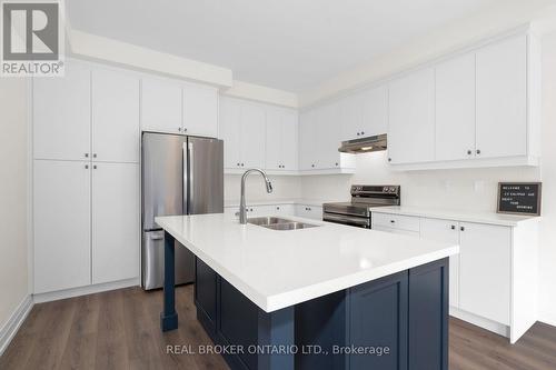 23 Calypso Avenue, Springwater, ON - Indoor Photo Showing Kitchen