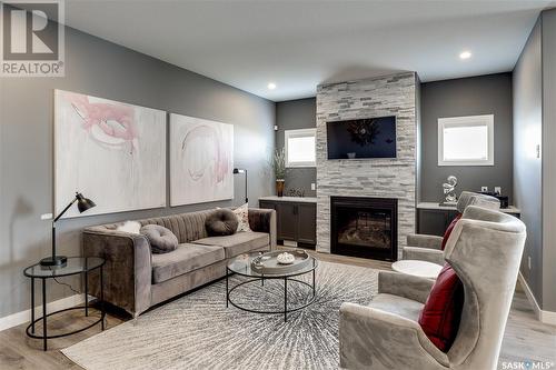 2977 Bellegarde Crescent, Regina, SK - Indoor Photo Showing Living Room With Fireplace