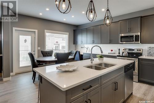 2977 Bellegarde Crescent, Regina, SK - Indoor Photo Showing Kitchen With Double Sink