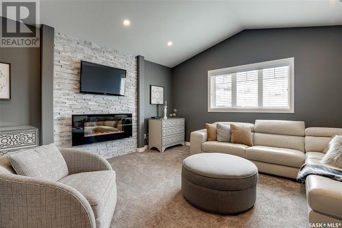 2977 Bellegarde Crescent, Regina, SK - Indoor Photo Showing Living Room With Fireplace