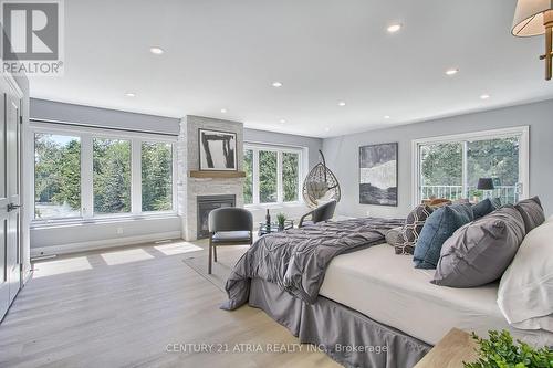 7580 16Th Side Road, King, ON - Indoor Photo Showing Bedroom With Fireplace