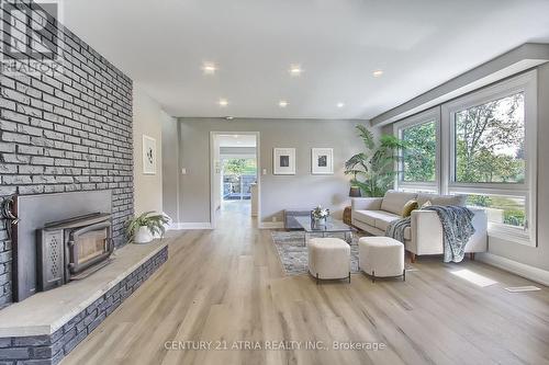 7580 16Th Side Road, King, ON - Indoor Photo Showing Living Room With Fireplace