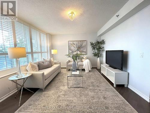 209 - 4640 Kimbermount Avenue, Mississauga, ON - Indoor Photo Showing Living Room