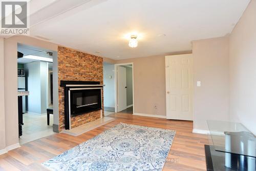 681 Crescent Road, Fort Erie, ON - Indoor Photo Showing Living Room With Fireplace