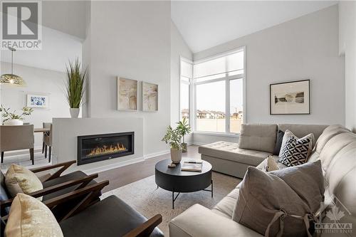 126 Orchsetra Way, Ottawa, ON - Indoor Photo Showing Living Room With Fireplace