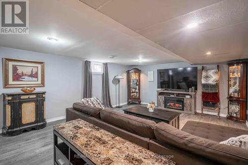 64 Melody Trail, St. Catharines, ON - Indoor Photo Showing Living Room With Fireplace