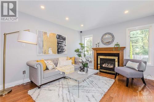 37 Hemlo Crescent, Ottawa, ON - Indoor Photo Showing Living Room With Fireplace