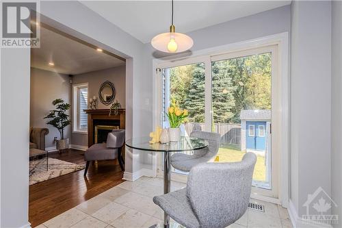 37 Hemlo Crescent, Ottawa, ON - Indoor Photo Showing Dining Room With Fireplace