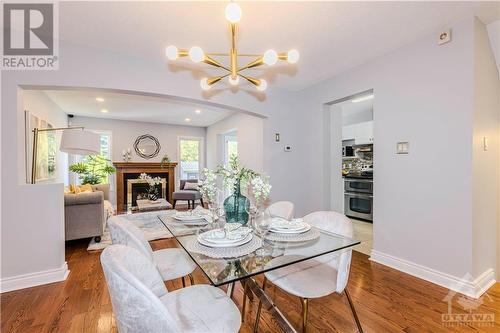 37 Hemlo Crescent, Ottawa, ON - Indoor Photo Showing Dining Room With Fireplace