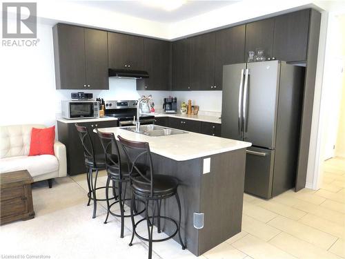 90 Larry Crescent, Caledonia, ON - Indoor Photo Showing Kitchen With Stainless Steel Kitchen With Double Sink