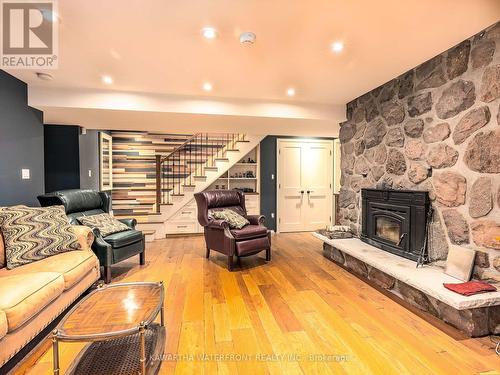 127 Sugarbush Crescent, Galway-Cavendish And Harvey, ON - Indoor Photo Showing Living Room With Fireplace