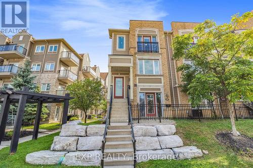 1 - 3010 Erin Centre Boulevard, Mississauga, ON - Outdoor With Balcony With Facade