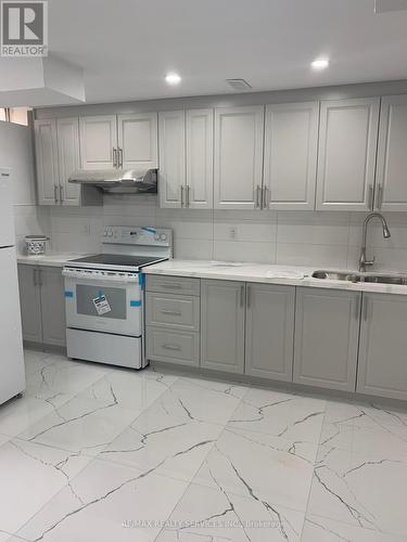 12 Fitzgibson Street, Brampton, ON - Indoor Photo Showing Kitchen With Double Sink