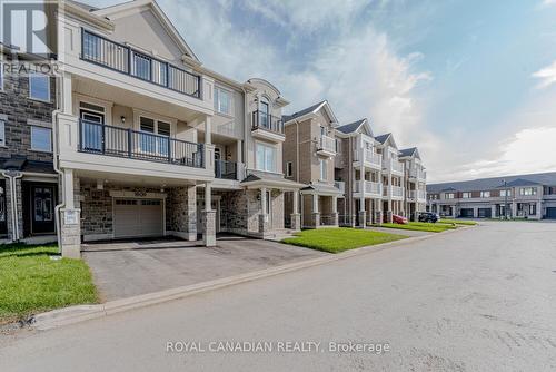 1909 Thames Circle, Milton, ON - Outdoor With Balcony With Facade