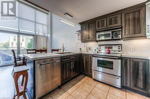 5 Father David Bauer Drive Unit# 103, Waterloo, ON - Indoor Photo Showing Kitchen With Stainless Steel Kitchen