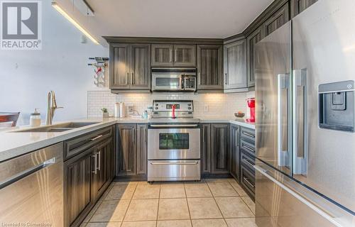 5 Father David Bauer Drive Unit# 103, Waterloo, ON - Indoor Photo Showing Kitchen With Stainless Steel Kitchen With Double Sink With Upgraded Kitchen