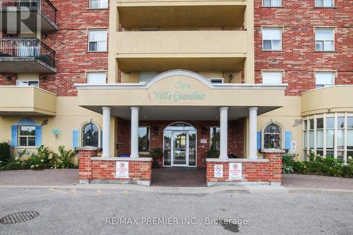 521 - 7373 Martin Grove Road, Vaughan (Vaughan Grove), ON - Outdoor With Balcony With Facade