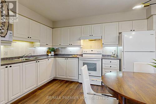 521 - 7373 Martin Grove Road, Vaughan (Vaughan Grove), ON - Indoor Photo Showing Kitchen With Double Sink