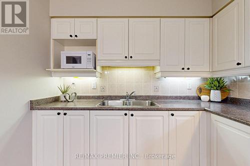 521 - 7373 Martin Grove Road, Vaughan (Vaughan Grove), ON - Indoor Photo Showing Kitchen With Double Sink