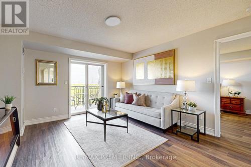 521 - 7373 Martin Grove Road, Vaughan, ON - Indoor Photo Showing Living Room