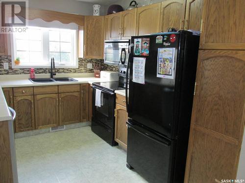 Ralph Acreage, Moose Range Rm No. 486, SK - Indoor Photo Showing Kitchen With Double Sink