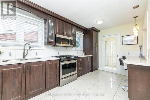 30 Stainforth Drive, Toronto, ON - Indoor Photo Showing Kitchen With Double Sink