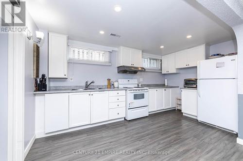 30 Stainforth Drive, Toronto, ON - Indoor Photo Showing Kitchen With Double Sink