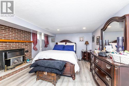 30 Stainforth Drive, Toronto (Agincourt South-Malvern West), ON - Indoor Photo Showing Bedroom With Fireplace