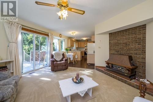 3751 James Court, Prince George, BC - Indoor Photo Showing Living Room With Fireplace