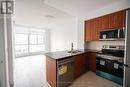 3210 - 225 Webb Drive, Mississauga, ON  - Indoor Photo Showing Kitchen With Stainless Steel Kitchen With Double Sink 