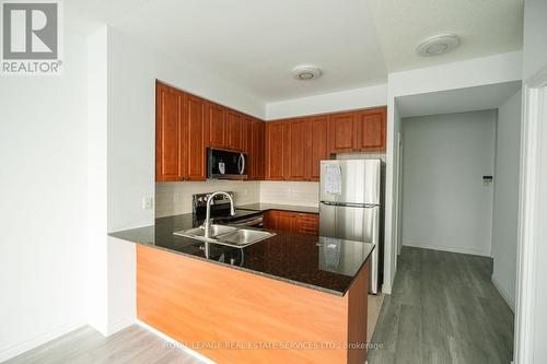 3210 - 225 Webb Drive, Mississauga, ON - Indoor Photo Showing Kitchen With Stainless Steel Kitchen With Double Sink