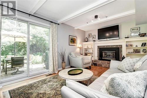 1885 Louisiana Avenue, Ottawa, ON - Indoor Photo Showing Living Room With Fireplace