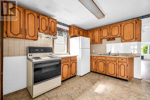 97 N Woodrow Boulevard, Toronto, ON - Indoor Photo Showing Kitchen With Double Sink