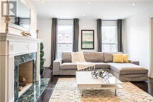 4 Mallingham Court, Toronto, ON - Indoor Photo Showing Living Room With Fireplace