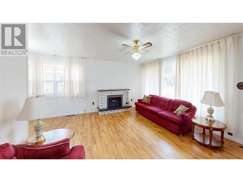 811 Glen  Drive, Trail, BC - Indoor Photo Showing Living Room With Fireplace