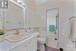 2 piece bath adjoining primary bedroom. - 