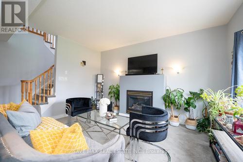 81 Shephard Avenue S, New Tecumseth, ON - Indoor Photo Showing Living Room With Fireplace