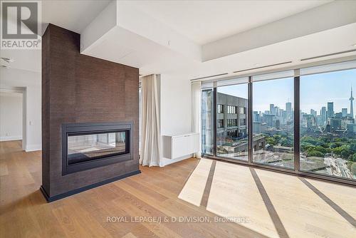 2805 - 200 Cumberland Street, Toronto, ON - Indoor Photo Showing Living Room With Fireplace