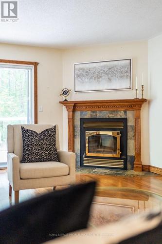 710 Airport Road, Quinte West, ON - Indoor Photo Showing Living Room With Fireplace