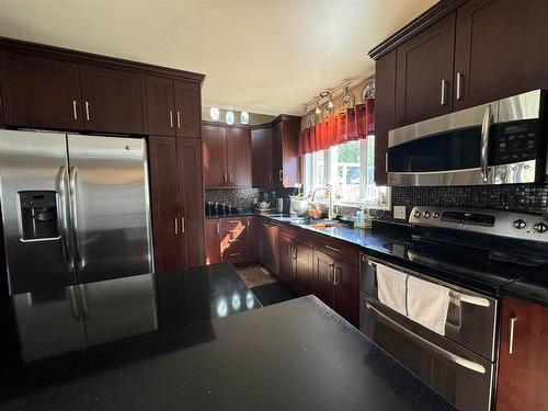 53 Hemlo Drive, Marathon, ON - Indoor Photo Showing Kitchen With Double Sink